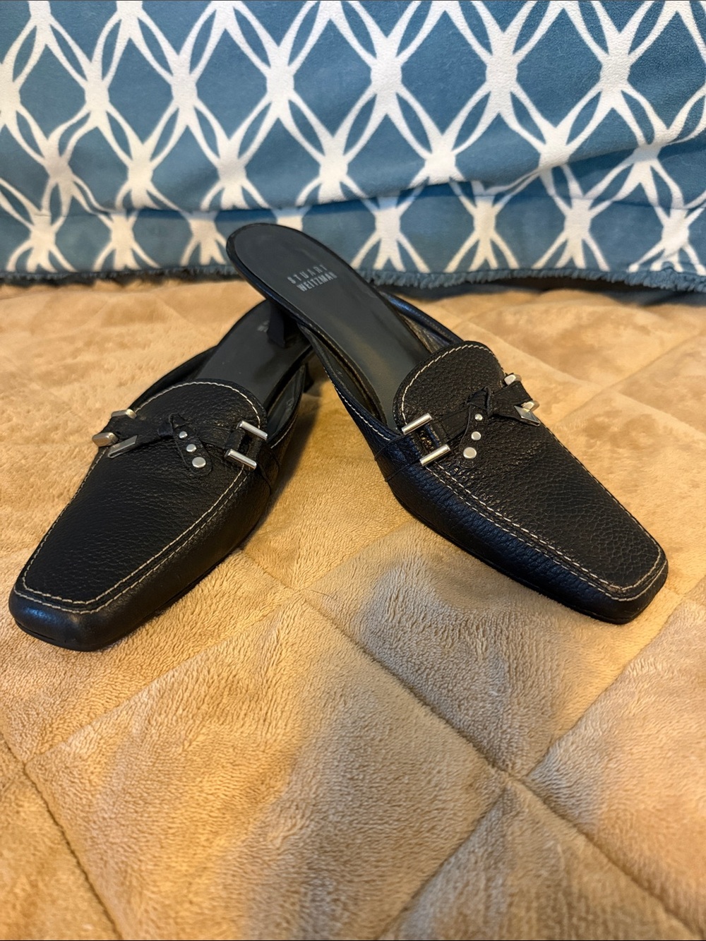 Stuart Weitzman Black Leather Pebbled kitten heel mules.